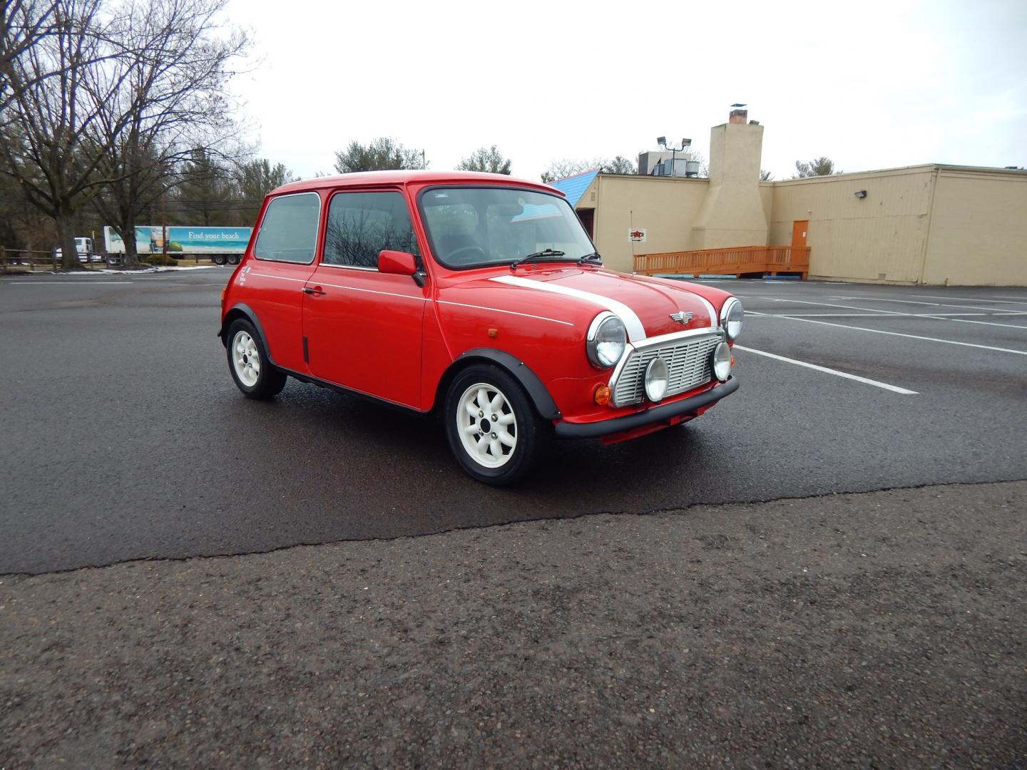 1981 RED /Black Cloth Austin Mini Cooper (AA25AU11248) with an 1275 CC engine, 4 speed manual transmission, located at 6528 Lower York Road, New Hope, PA, 18938, (215) 862-9555, 40.358707, -74.977882 - Very cool, great driving 1981 Austin Mini-Cooper. We believe it is a 1981 due to the rear taillights. The title shows it as a 1969 model year, however the cars built in the 1960s had outside door hinges. Also , the windows were sliding instead of the roll up windows this vehicle has.. Red/ whit - Photo#0